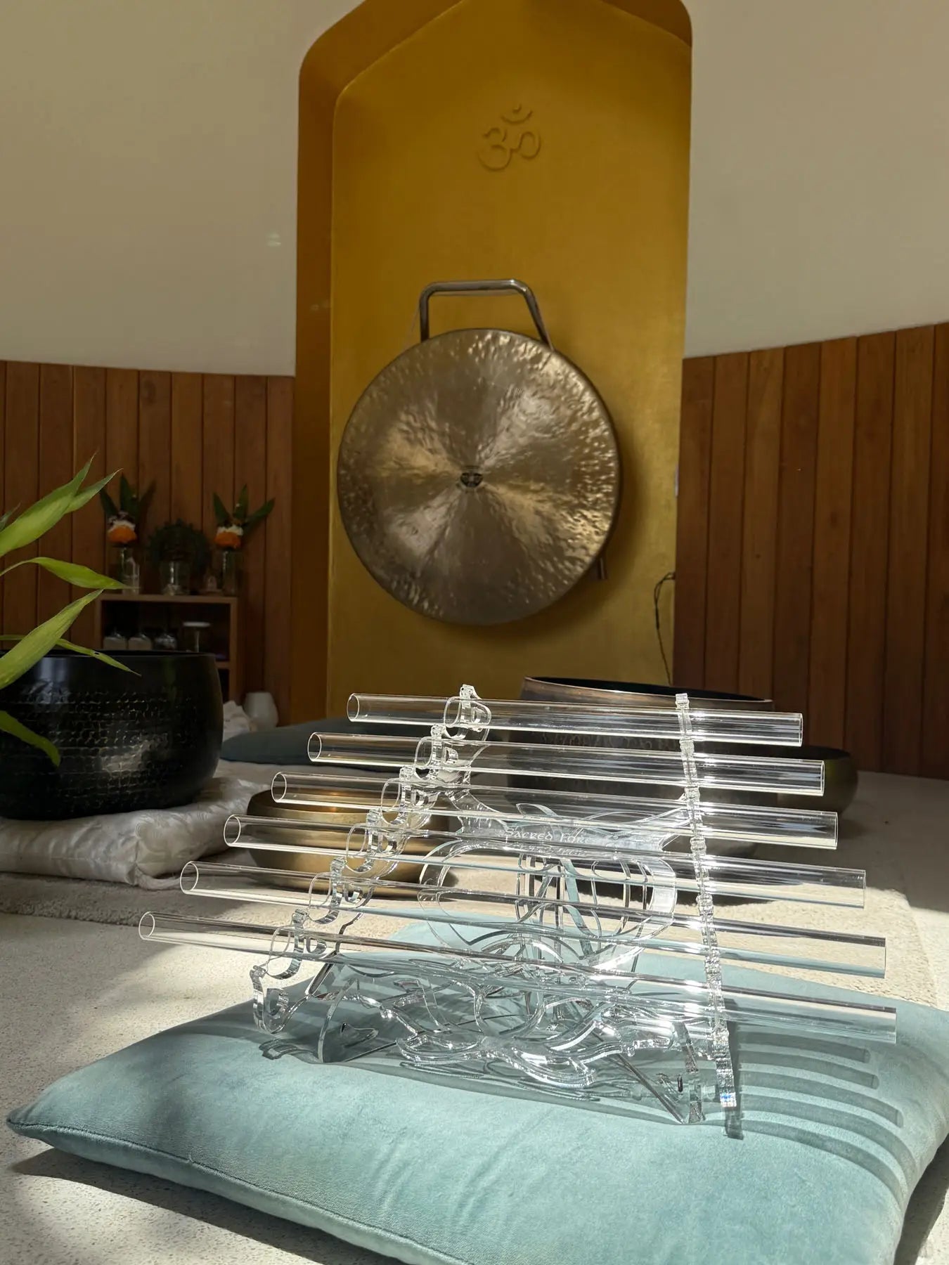 Crystal Harp quartz tubes extreme close-up showing light refractions