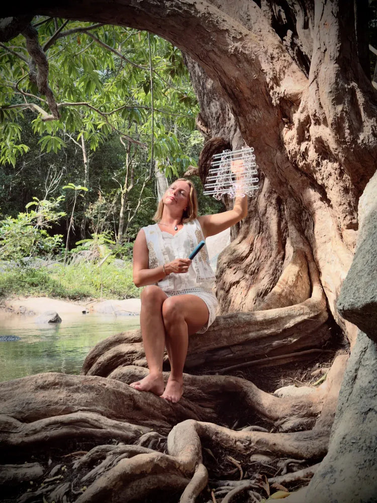 
                    
                      Lotus C# Sacred Forest Crystal Harp 432 hz played by Natalia sitting under beautiful old tree by the river giving sound healing in nature
                    
                  