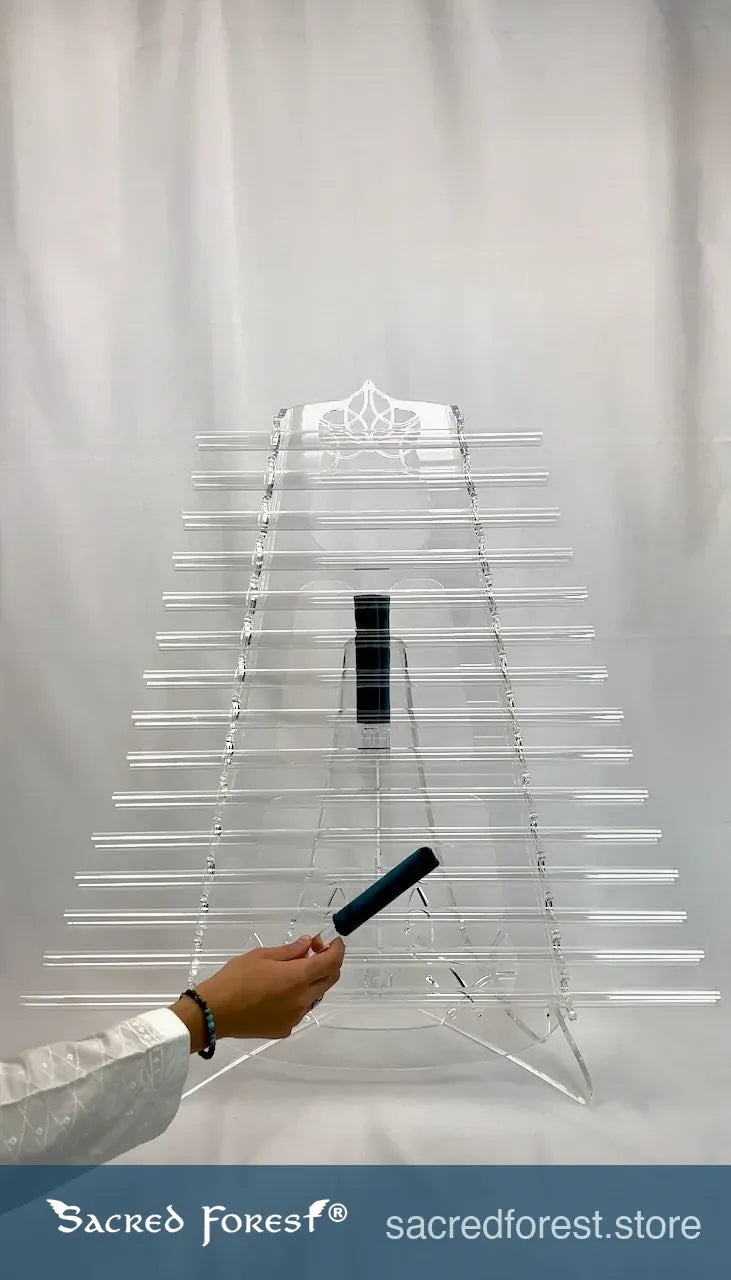 
                    
                      Planetary C Crystal Harp by Sacred Forest being played with a mallet for sound healing and meditation sessions
                    
                  