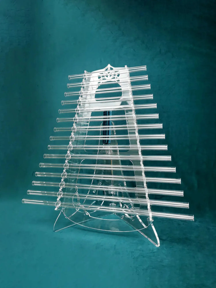 Crystal Harp Planetary C Moon Edition with 15 quartz tubes on teal velvet studio background