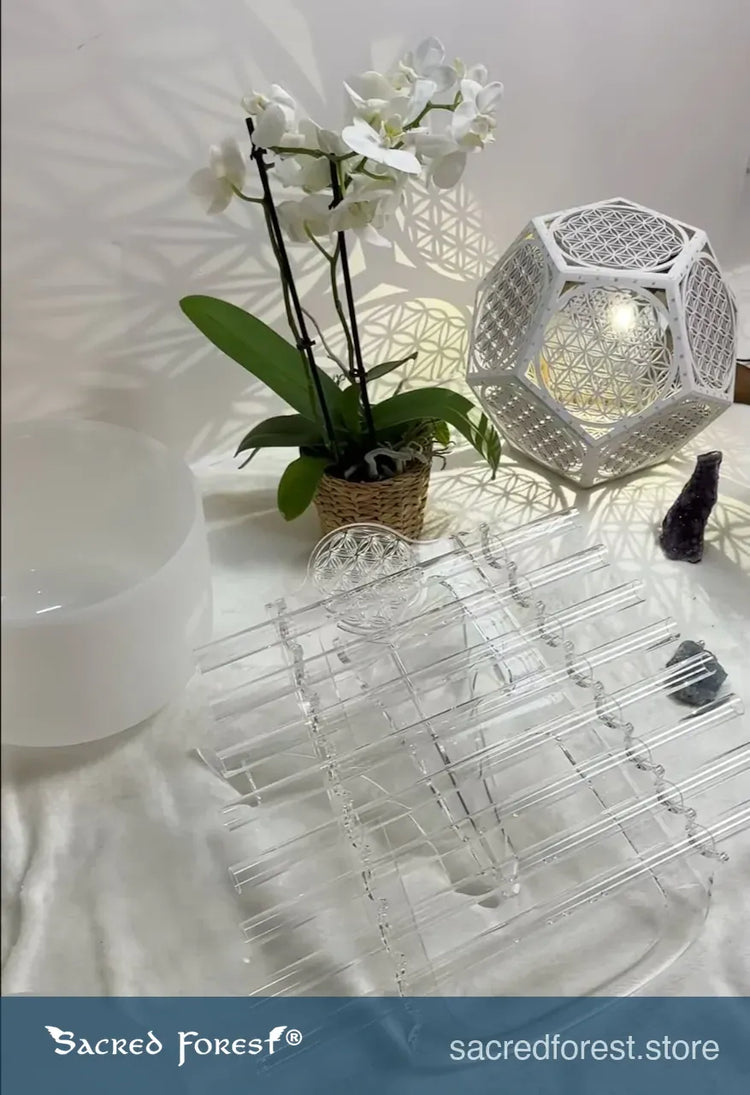 
                    
                      Chakra C Crystal Harp by Sacred Forest with sacred geometry lamp white crystal singing bowl white orchidea and crystal stones
                    
                  